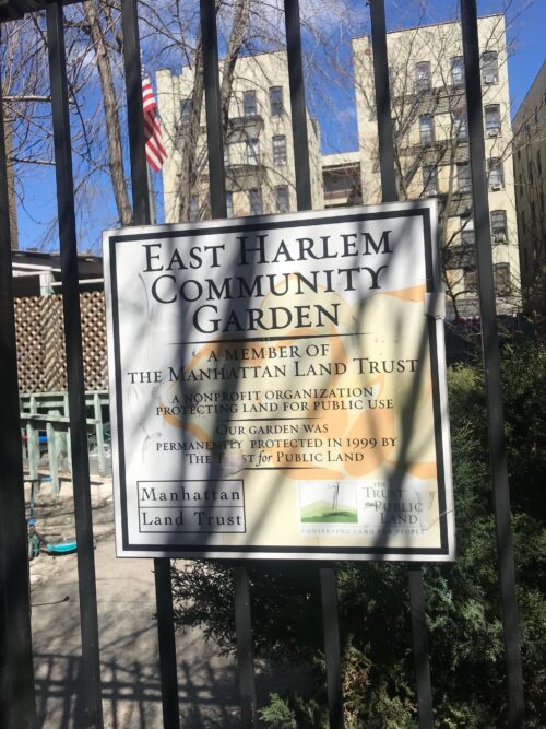 A sign on a Manhattan Land Trust community garden in Harlem. Photo by Jessica Saab for NY4P.